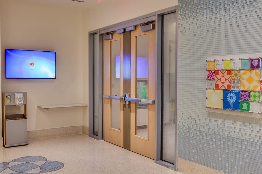 VT High Pressure Decorative Laminate Doors shown in the elevator vestibule